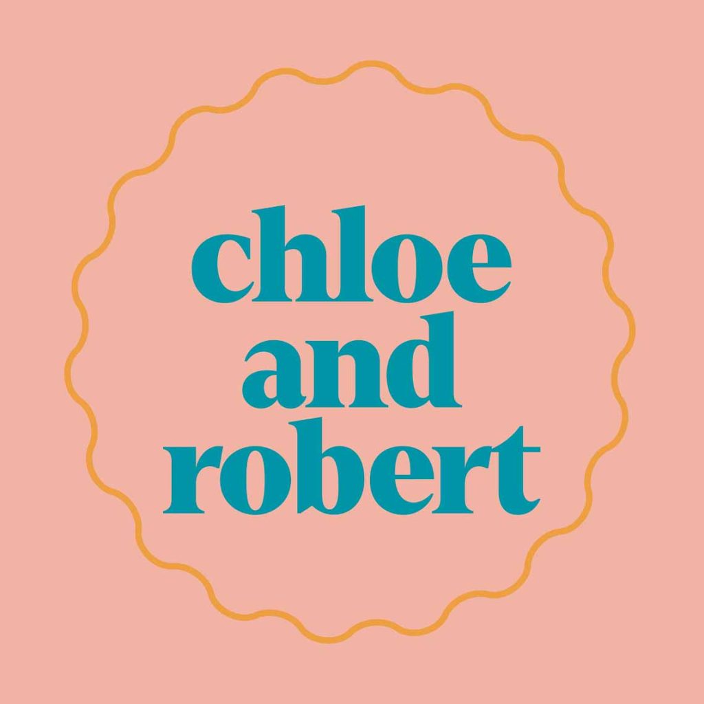 Luxe Wedding Photo Album with fun creative cover design in aqua and peach with wavy border