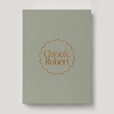 Personalised Book Cloth Wedding Photo Album with a silk fabric cover in colour Olive. Available in 3 formats; Landscape (horizontal), Square & Portrait (vertical) in 3 sizes; small, medium and large photo albums.