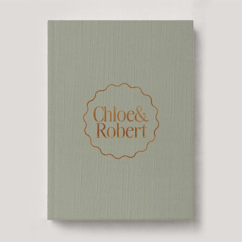 Personalised Book Cloth Wedding Photo Album with a silk fabric cover in colour Olive. Available in 3 formats; Landscape (horizontal), Square & Portrait (vertical) in 3 sizes; small, medium and large photo albums.