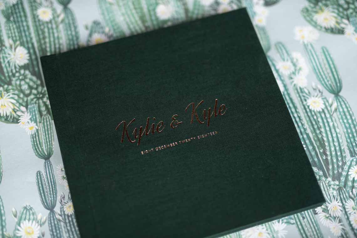 Personalised Wedding Guest Book choose from leather, linen or silk covers with custom lettering including your names and wedding date. Green wedding colour theme.