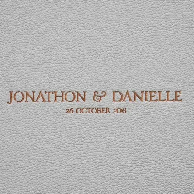 Classic Leather Photo Album in colour Ivory with Gold lettering. Ivory leather photo album cover with gold embossing perfect for a neutral toned wedding colour palette.