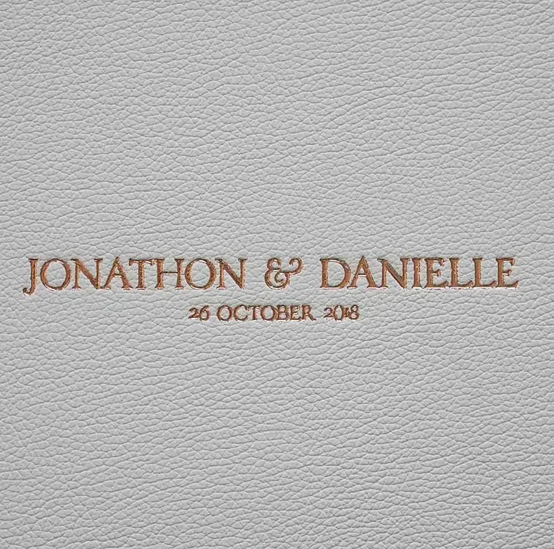 Classic Leather Photo Album in colour Ivory with Gold lettering. Ivory leather photo album cover with gold embossing perfect for a neutral toned wedding colour palette.