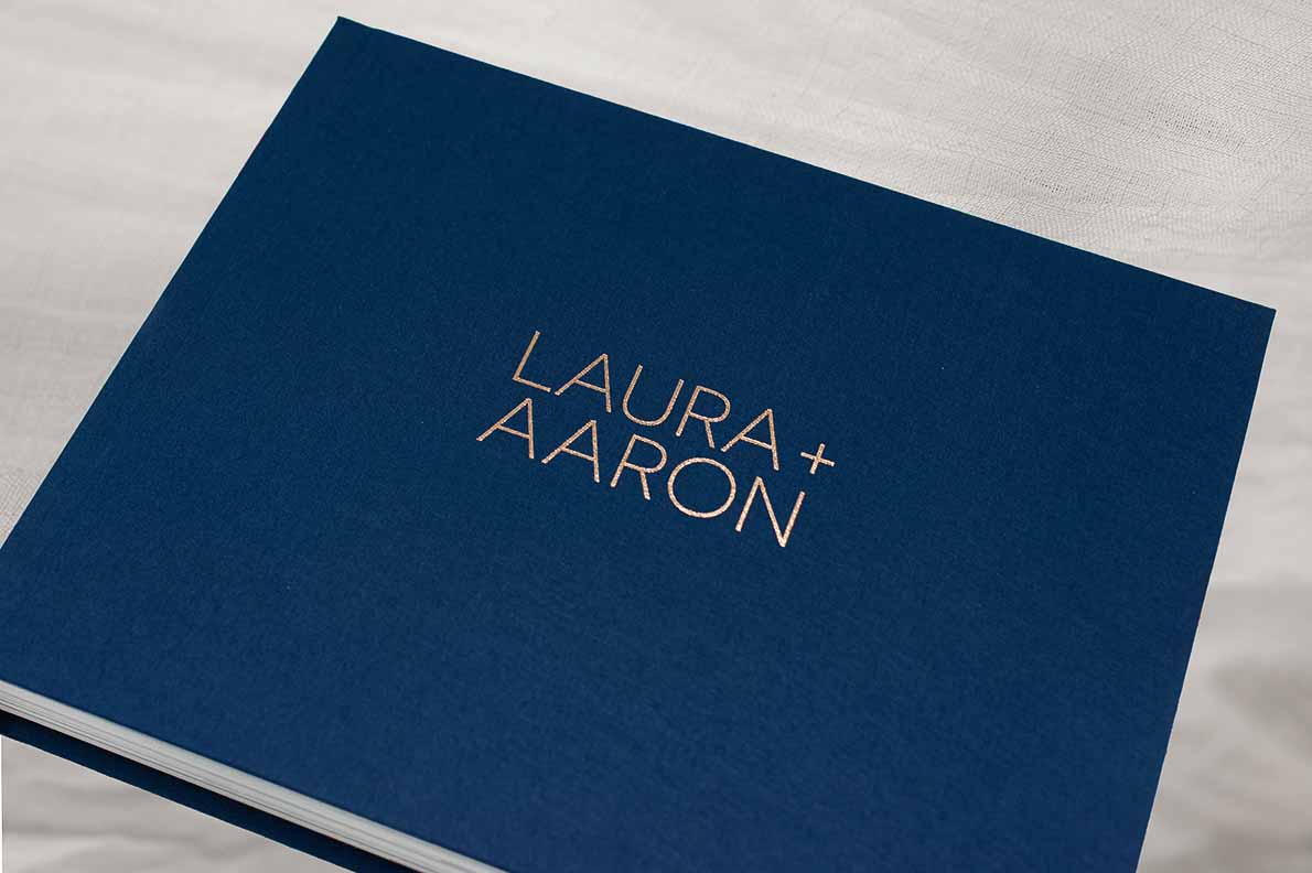 Memorable Wedding Album with a luxe linen cover in colour navy blue with rose gold lettering