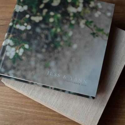 Wedding album with photo cover and custom lettering overprinted on the image