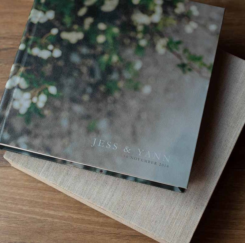 Wedding album with photo cover and custom lettering overprinted on the image