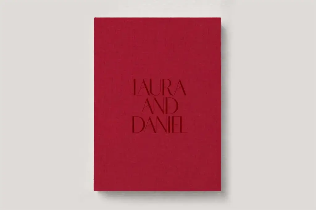 Premium Wedding Photo Album with luxe linen cover in colour Candy Apple. Available in 3 formats; Landscape (horizontal), Square & Portrait (vertical) in 3 sizes; small, medium and large photo albums.