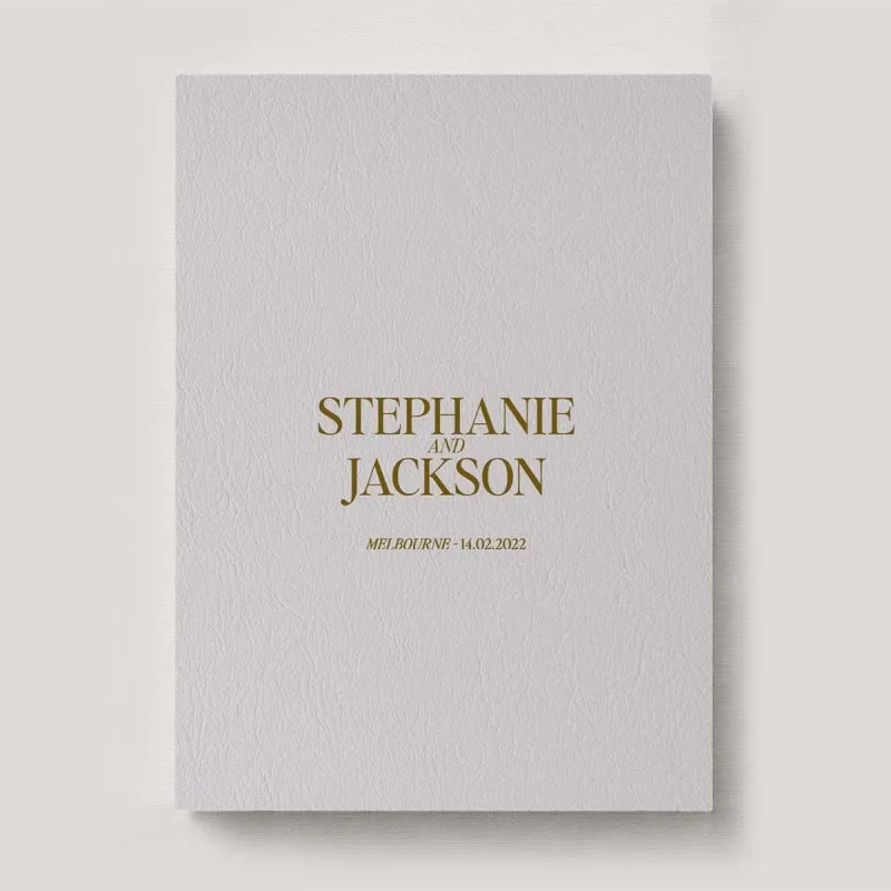 Premium Leather Wedding Photo Album in colour Ash (pale grey-ish neutral). Available in 3 formats; Landscape (horizontal), Square & Portrait (vertical) in 3 sizes; small, medium and large photo albums.