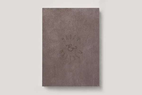 Premium Leather Wedding Photo Album in colour Basalt (grey-ish brown). Available in 3 formats; Landscape (horizontal), Square & Portrait (vertical) in 3 sizes; small, medium and large photo albums.