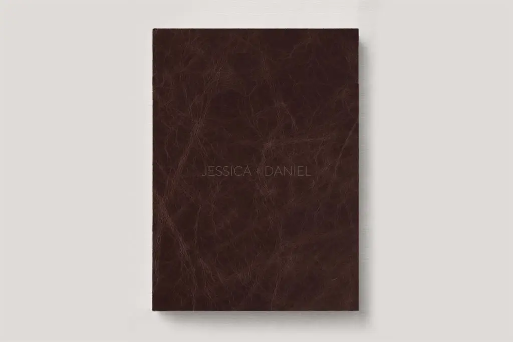 Premium Leather Wedding Photo Album in colour Cedar (warm chocolate brown). Available in 3 formats; Landscape (horizontal), Square & Portrait (vertical) in 3 sizes; small, medium and large photo albums.