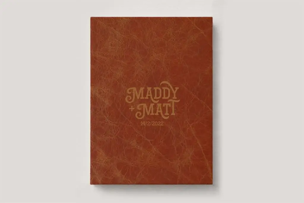 Premium Leather Wedding Photo Album in colour Terracotta (tan rusty brown). Available in 3 formats; Landscape (horizontal), Square & Portrait (vertical) in 3 sizes; small, medium and large photo albums.