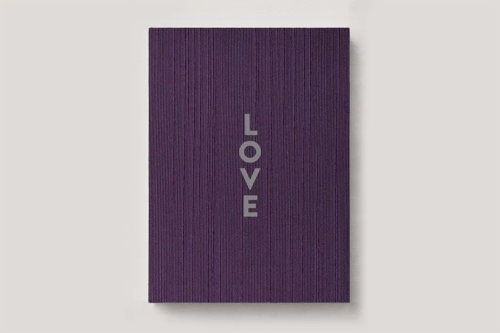 Personalised Book Cloth Wedding Photo Album with a silk fabric cover in colour Aubergine. Available in 3 formats; Landscape (horizontal), Square & Portrait (vertical) in 3 sizes; small, medium and large photo albums.