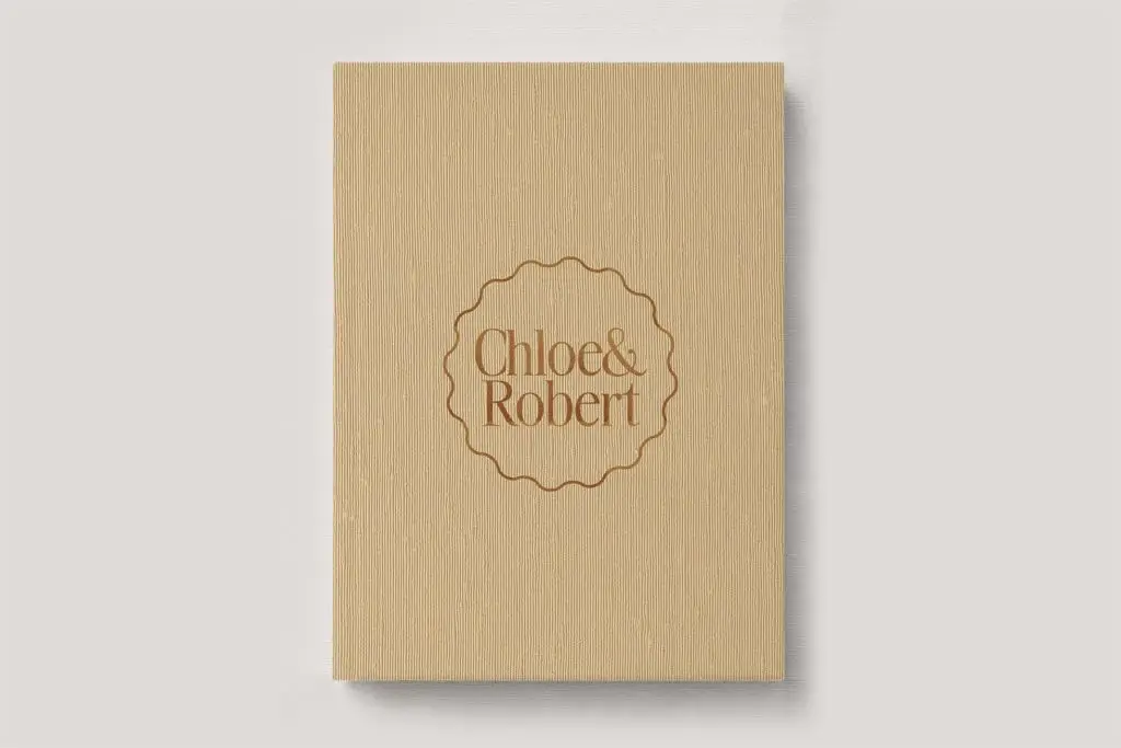 Personalised Book Cloth Wedding Photo Album with a silk fabric cover in colour Marigold. Available in 3 formats; Landscape (horizontal), Square & Portrait (vertical) in 3 sizes; small, medium and large photo albums.