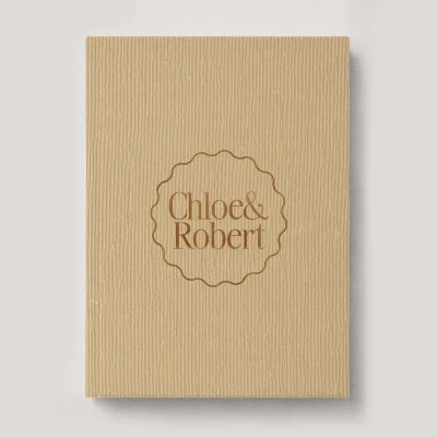 Personalised Book Cloth Wedding Photo Album with a silk fabric cover in colour Marigold. Available in 3 formats; Landscape (horizontal), Square & Portrait (vertical) in 3 sizes; small, medium and large photo albums.