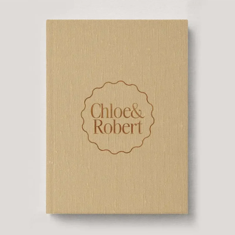 Personalised Book Cloth Wedding Photo Album with a silk fabric cover in colour Marigold. Available in 3 formats; Landscape (horizontal), Square & Portrait (vertical) in 3 sizes; small, medium and large photo albums.