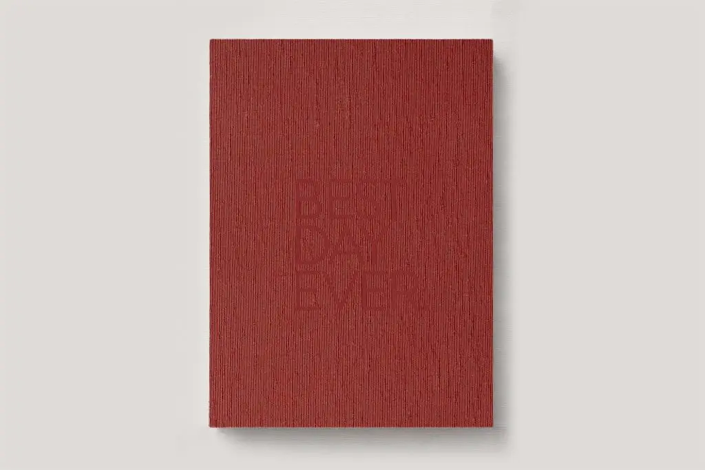 Personalised Book Cloth Wedding Photo Album with a silk fabric cover in colour Rust. Available in 3 formats; Landscape (horizontal), Square & Portrait (vertical) in 3 sizes; small, medium and large photo albums.