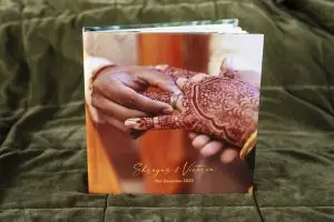 A Coffee Table Wedding Album with Photo Wrap Cover for a colourful cultural Indian wedding multi-day celebration
