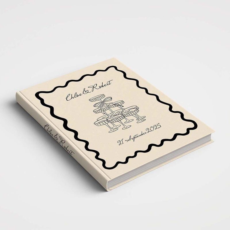 Wedding Album with Printed Fabric Cover - Designs include a range of illustrations with a wedding cake, champagne glasses toasting congratulations and more