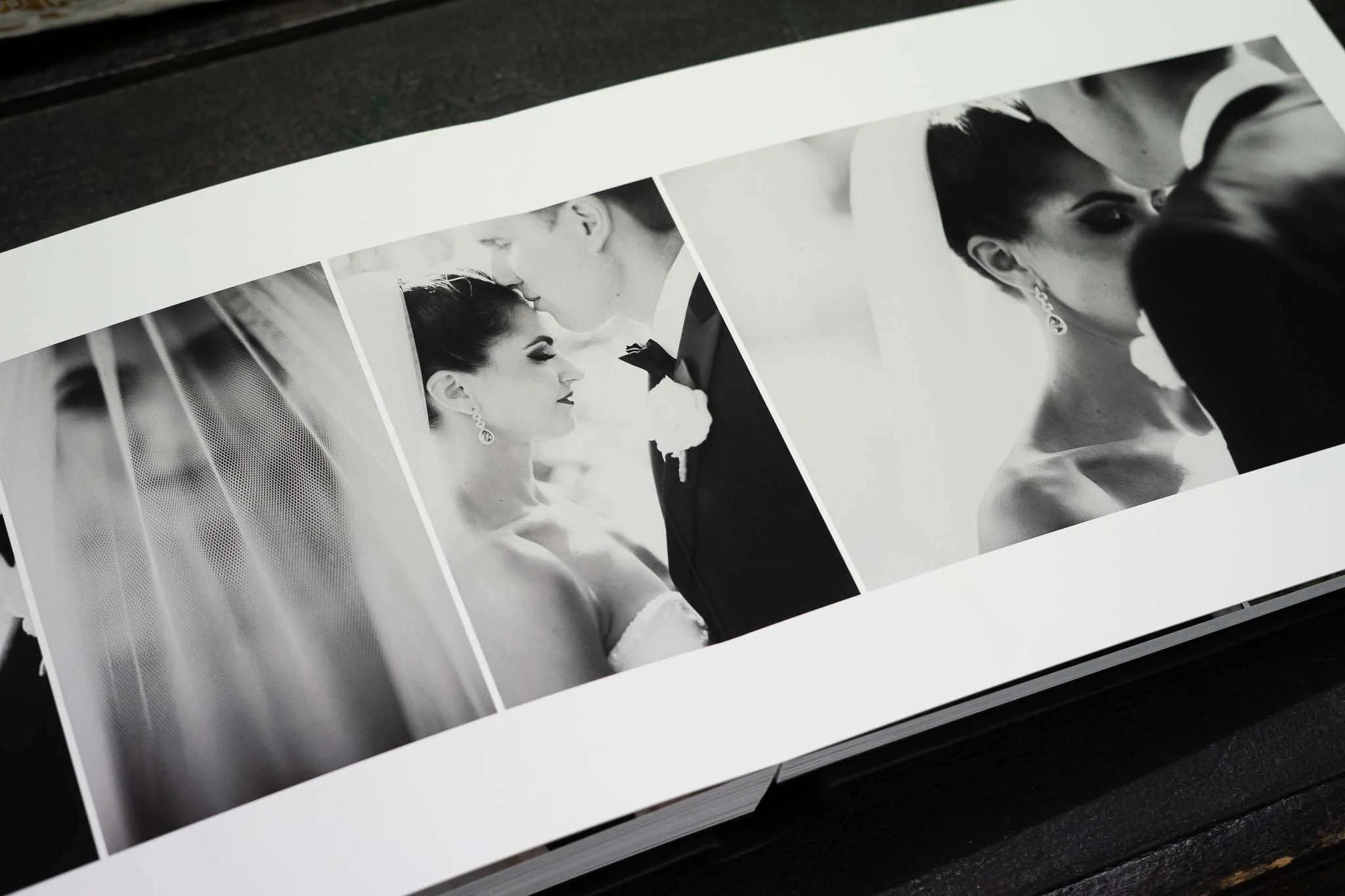 Your wedding photos laid out in a beautiful wedding photo album designed by The Coffee Table Book