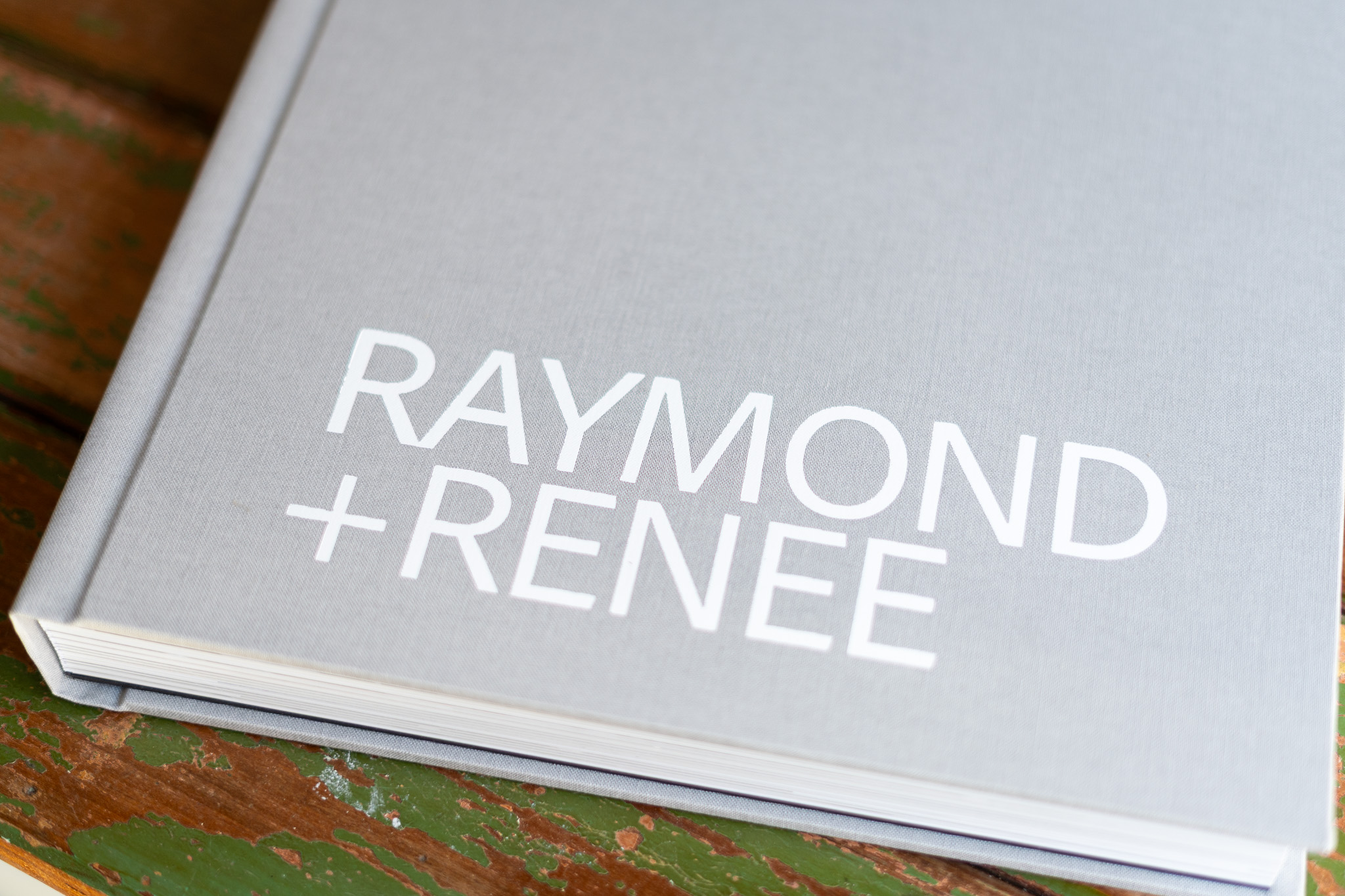 Designing Wedding Albums For Candid and Editorial Photography. Wedding Album Fashion Collection — Light Grey Linen Cover with White Lettering in Bold Typography