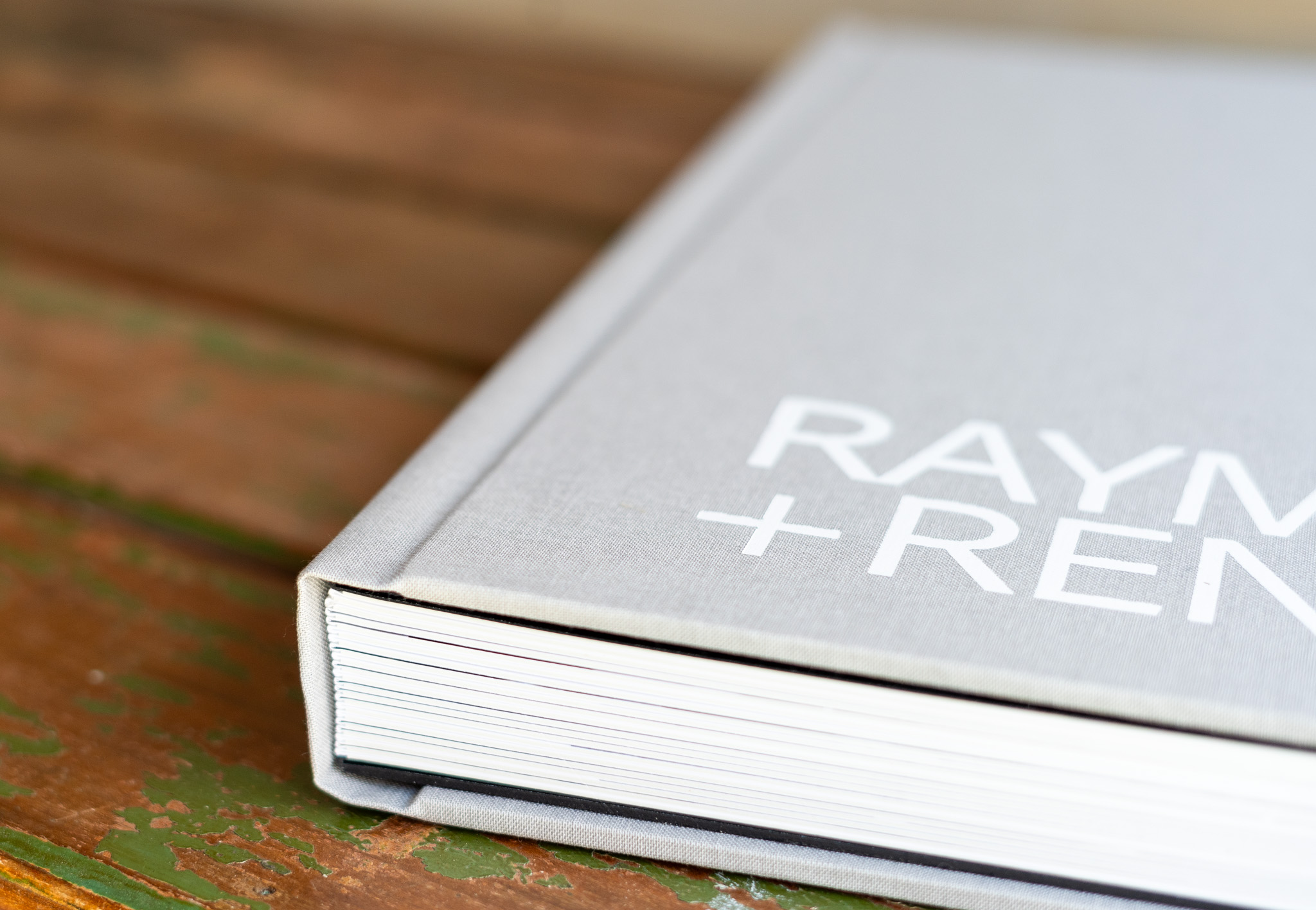 Designing Wedding Albums For Candid and Editorial Photography. Wedding Album Fashion Collection — Light Grey Linen Cover with White Lettering in Bold Typography