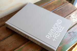 Wedding Albums for Editorial & Candid Photography. Wedding Album Fashion Collection — Light Grey Linen Cover with White Lettering in Bold Typography.