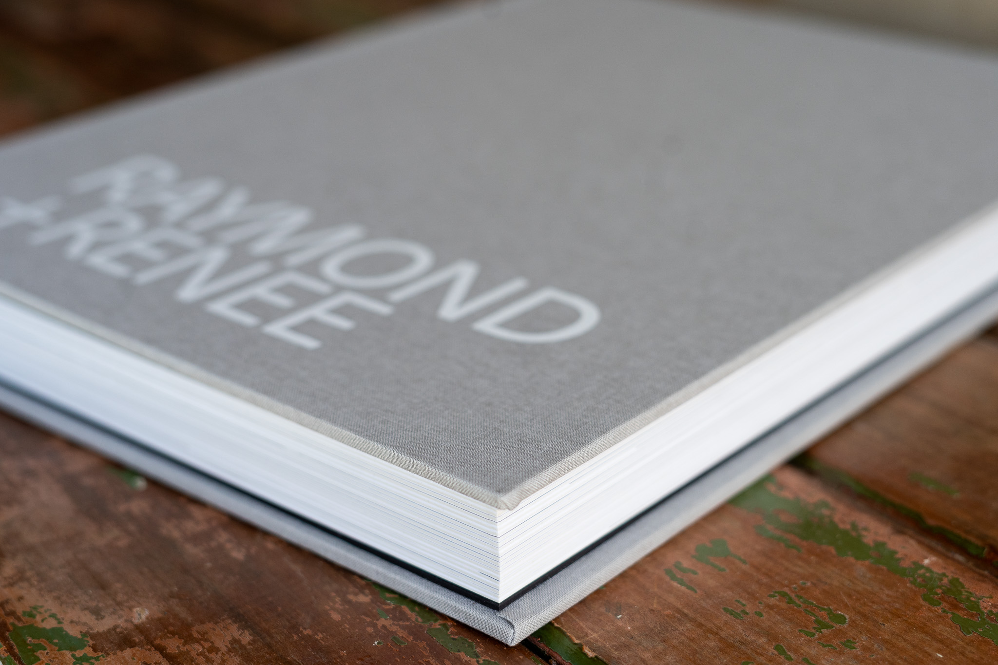 Luxury Wedding Album Cover Materials for Editorial Photography. Wedding Album Fashion Collection — Light Grey Linen Cover with White Lettering in Bold Typography