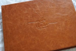 June is here and winter wedding album covers just hit at the right time. Nostalgia Collection Wedding Albums & Coffee Table Books featuring a fine art wedding photo album with a premium leather cover in a rustic brown palette