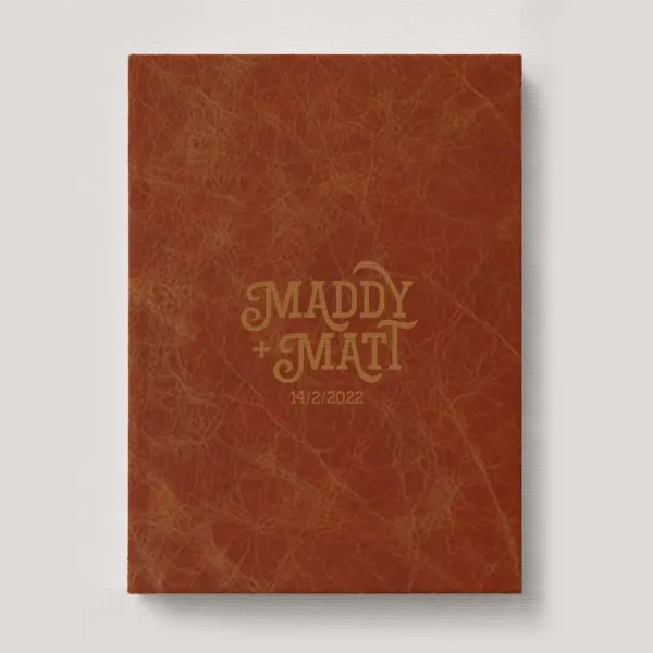 Premium Leather Wedding Photo Album in colour Terracotta (tan rusty brown). Available in 3 formats; Landscape (horizontal), Square & Portrait (vertical) in 3 sizes; small, medium and large photo albums.
