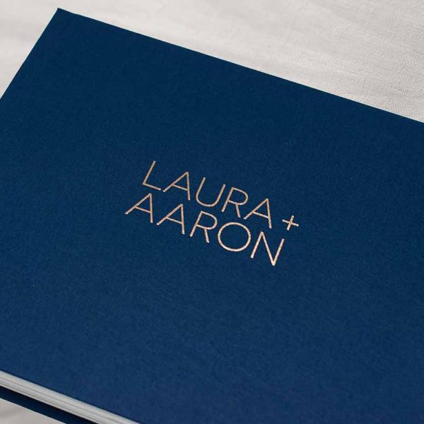 Memorable Wedding Album with a luxe linen cover in colour navy blue with rose gold lettering